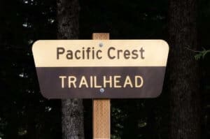 Pacific Crest Trail sign on wooden post